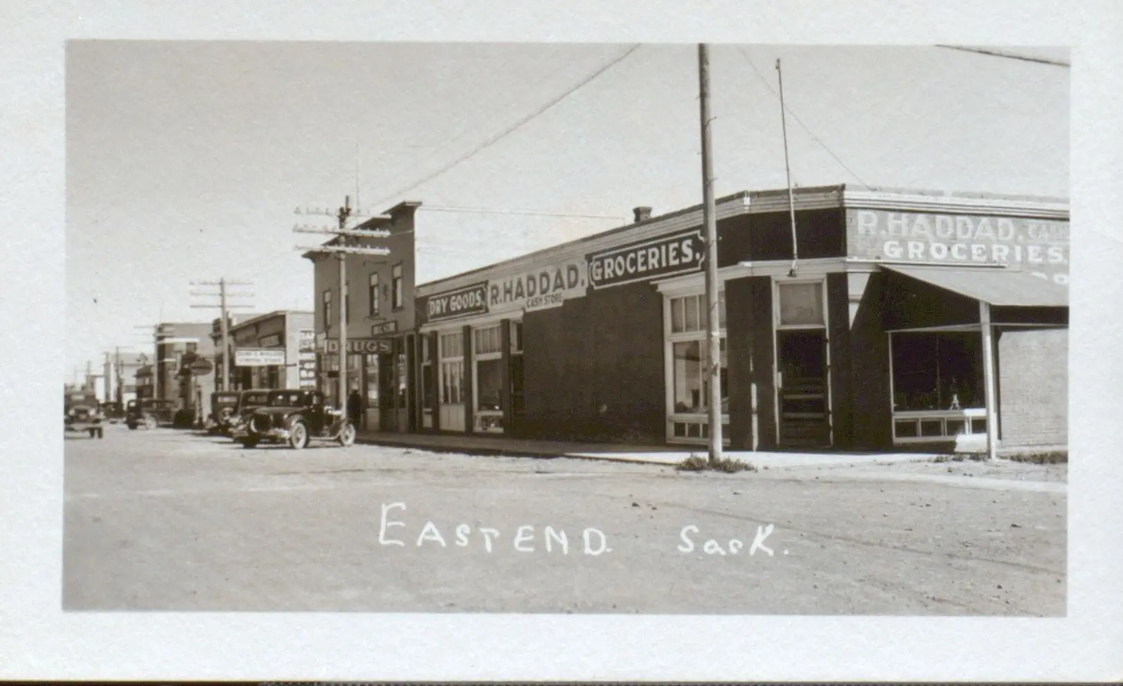 Main Street with R. Haddad's dry goods and groceries store
